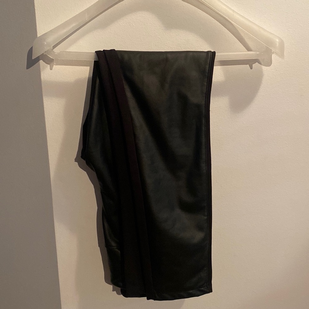Large JC penny never worn pleather tights. Tags on.
